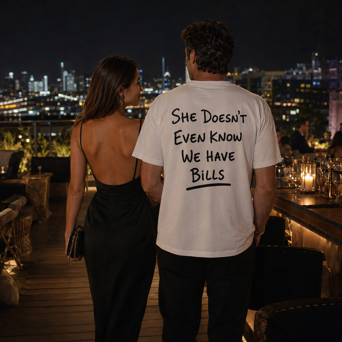 She Doesn't Even Know We Have Bills Back Print Graphic Tee